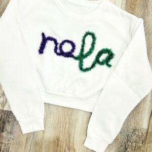 handcrafted white sweatshirt with NOLA custom yarn work